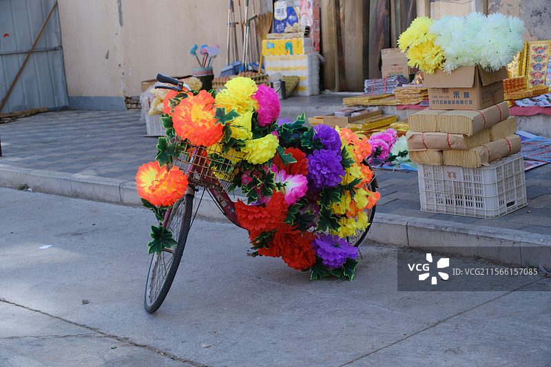 清明节。清明。假花。烧纸。祭祀用品。民间售卖图片素材