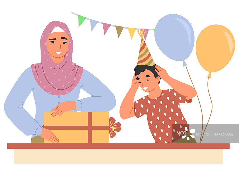 一位戴头巾的母亲展现出快乐的时刻图片素材