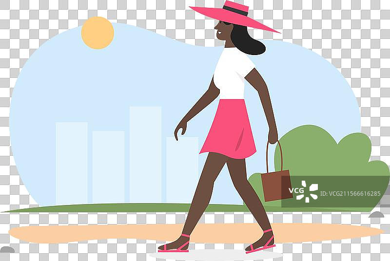 戴着帽子的快乐女性在阳光明媚的天气中散步图片素材