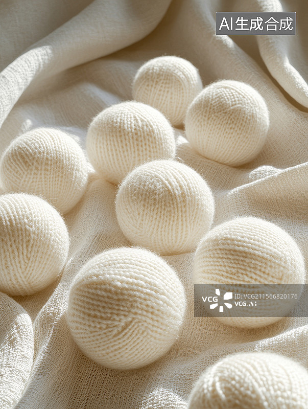 【AI数字艺术】白色毛线球堆叠在柔软织物上图片素材