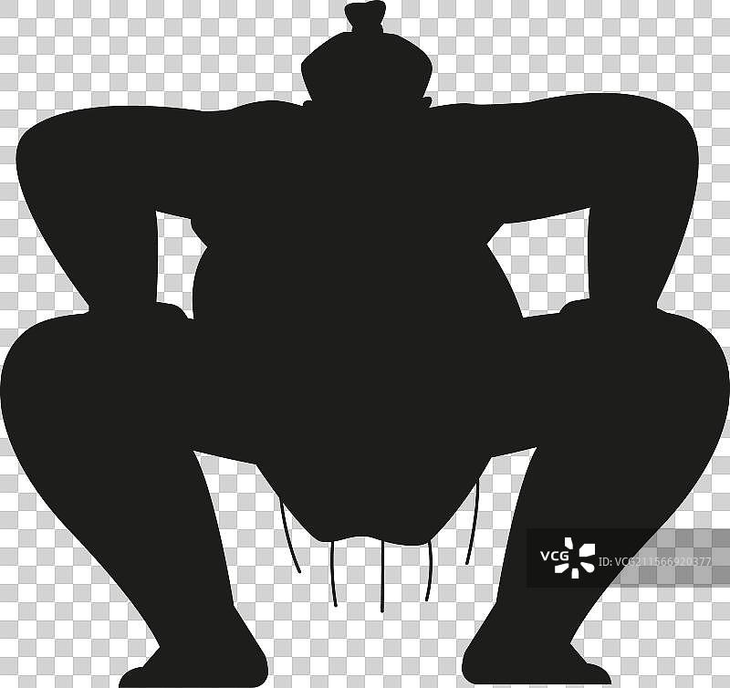 相扑选手以蹲姿站立图片素材