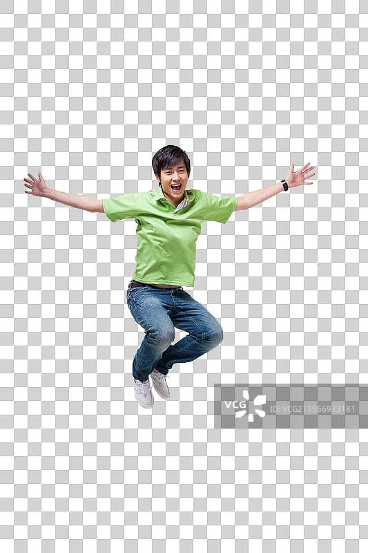快乐的年轻男人跳跃图片素材