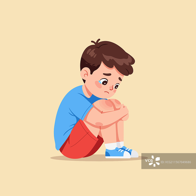 独自坐着抱膝而哭的小男孩图片素材