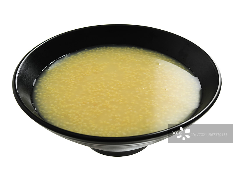 一碗传统早餐粮食小米粥特写的白底图图片素材