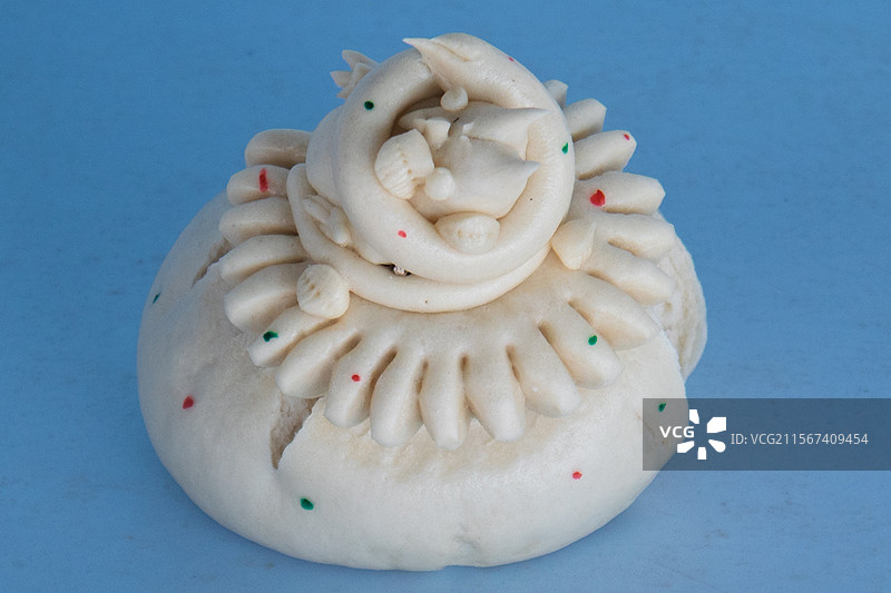 山西晋城农村过春节蒸的送给未成年儿童的面塑--花馍图片素材