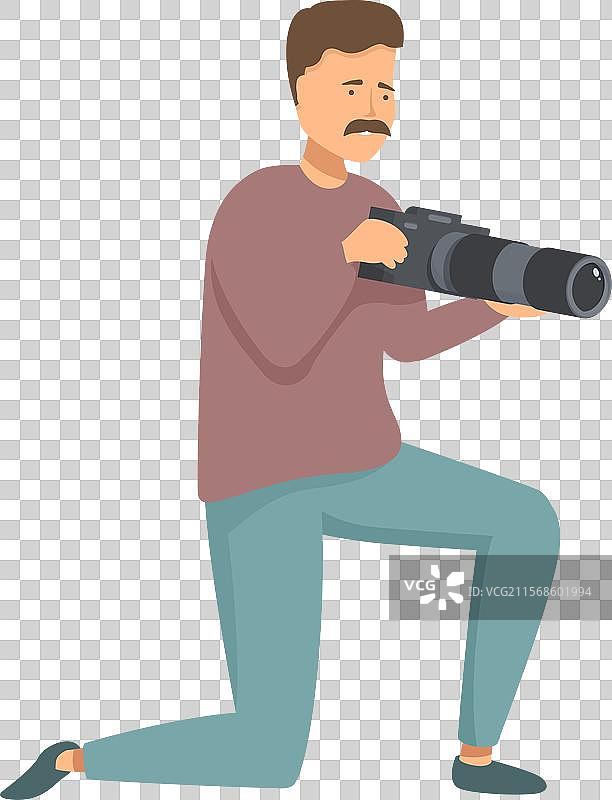 专业摄影师跪下拍摄图片素材