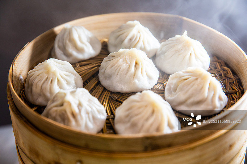 早点小笼包小馄饨鲜肉小馄饨鲜肉汤包汤包上海特产无锡小笼包南京汤包蒸笼蒸包子烟火气馄饨小馄饨面食早餐图片素材