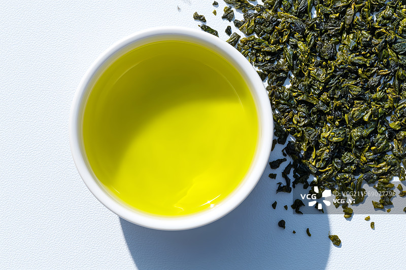 【AI数字艺术】白色茶杯茶汤茶色俯拍图图片素材