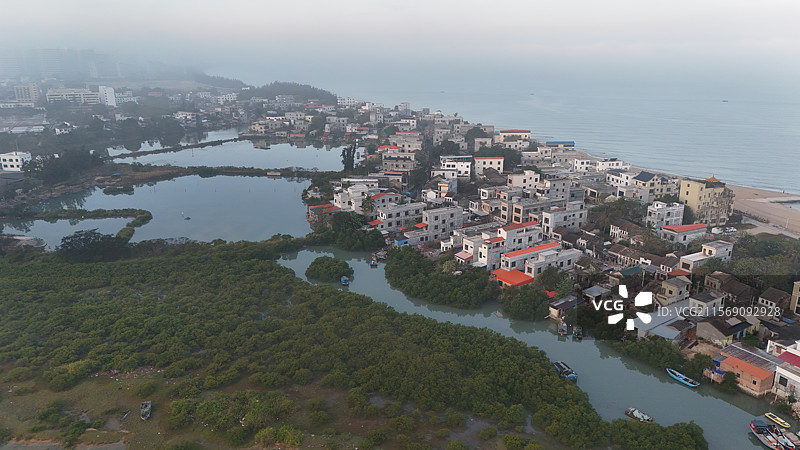 晨雾中的海南省东方市八所镇海岸线航拍图片素材