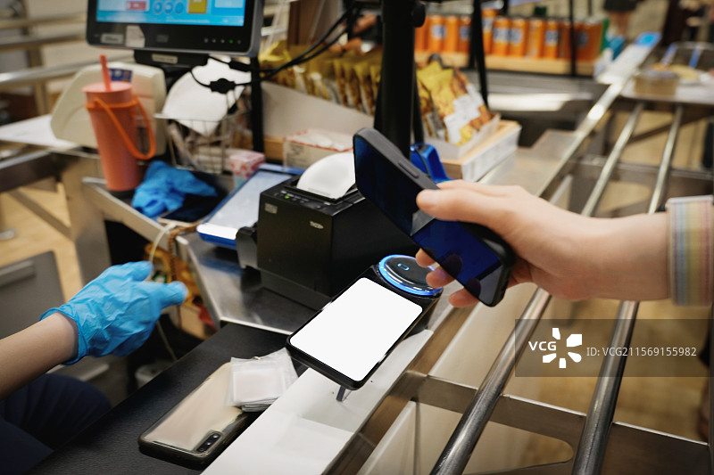 超市收银台移动支付图片素材