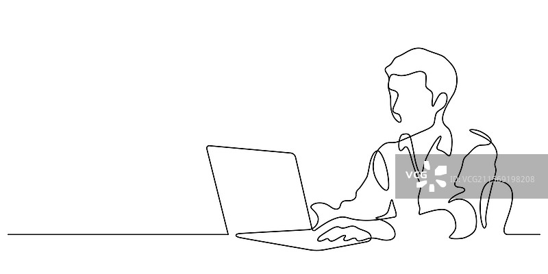 年轻男子在使用笔记本电脑图片素材