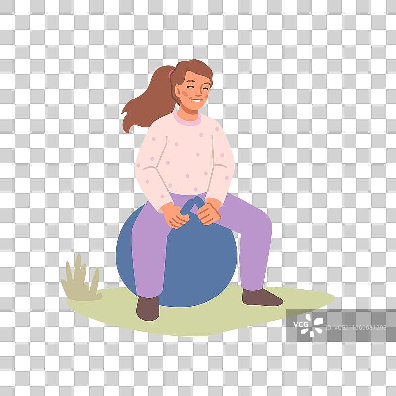 女孩在草地上跳跃，弹跳在大球上图片素材