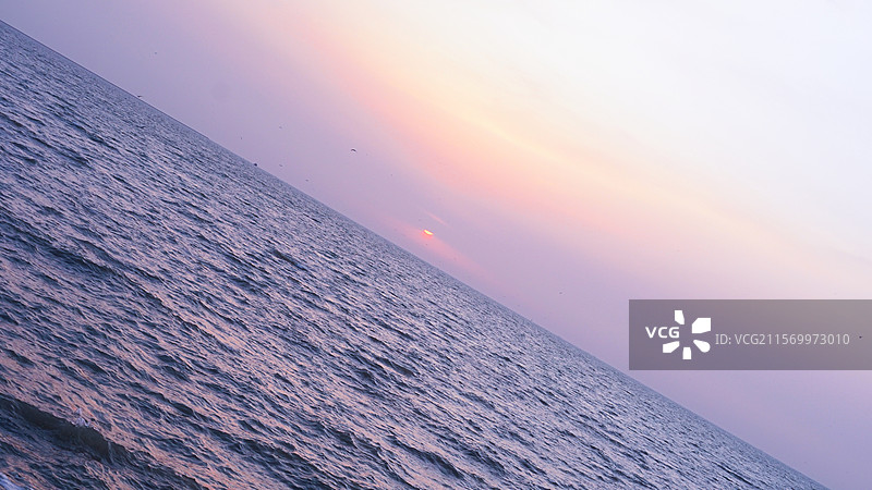 天津东疆湾沙滩景区日落图片素材