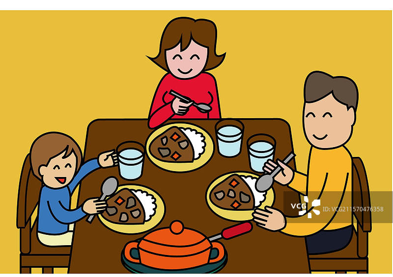 父母和孩子们一起吃咖喱图片素材