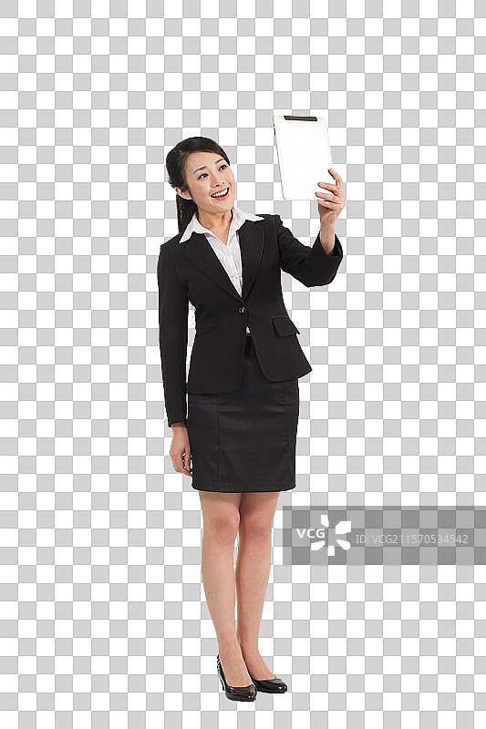 棚拍商务女士手拿平板电脑图片素材