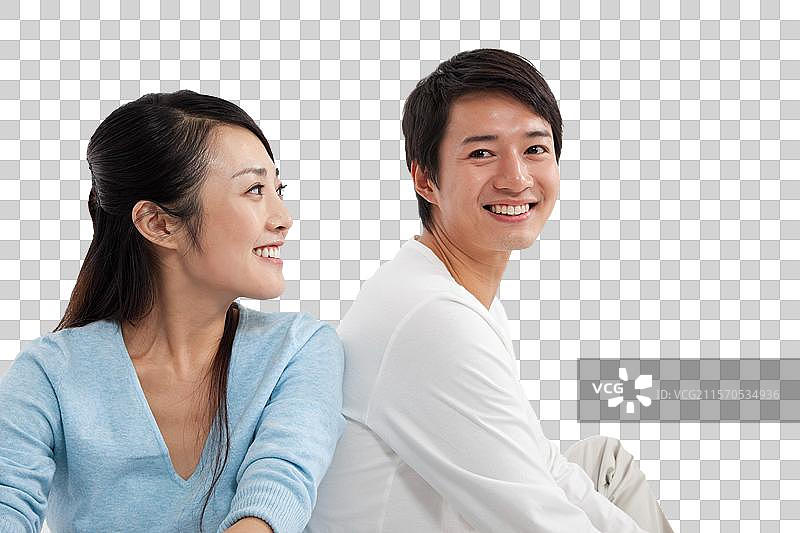 棚拍休闲装情侣坐着图片素材