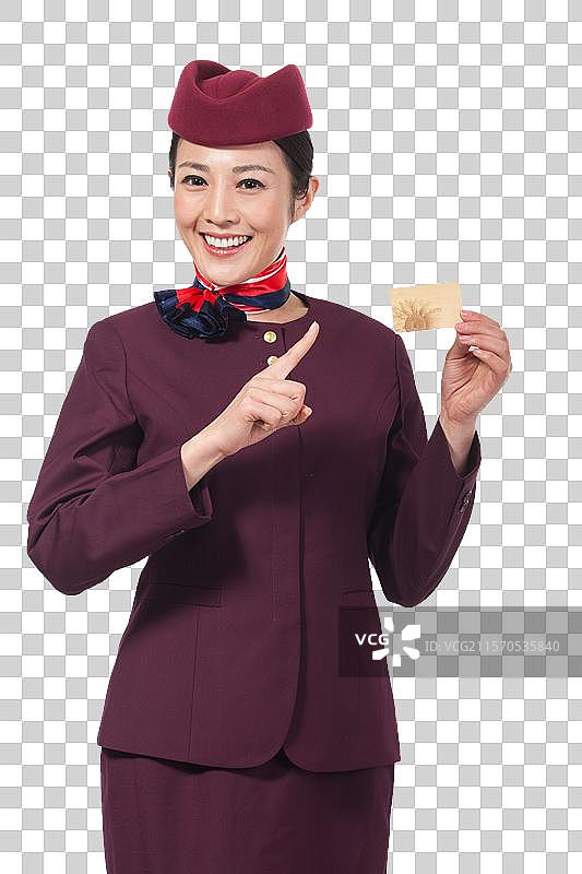 棚拍年轻女服务员展示银行卡图片素材
