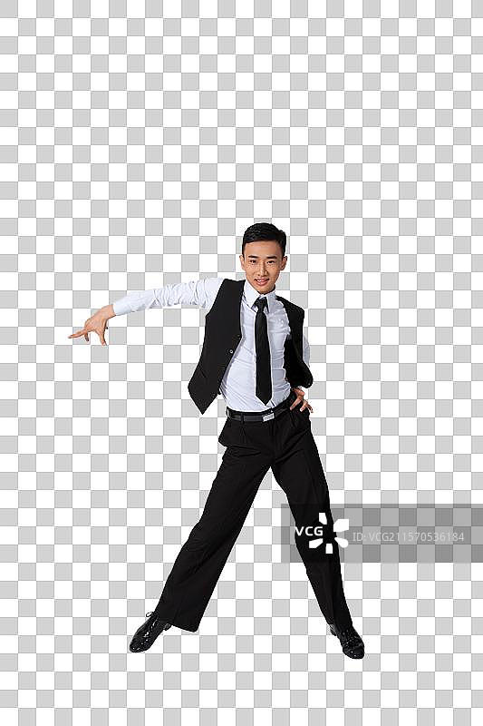 棚拍年轻男演员跳国标舞图片素材