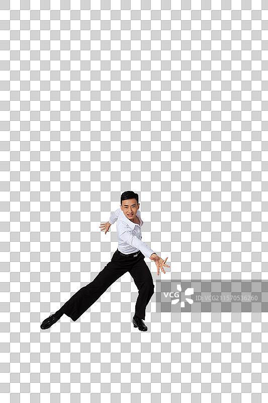 棚拍年轻男演员跳国标舞图片素材