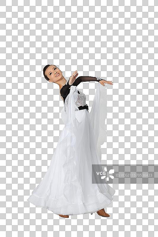 棚拍年轻女演员跳国标舞图片素材