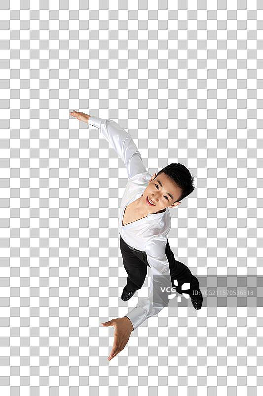 棚拍年轻男演员跳国标舞图片素材