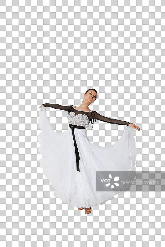 棚拍年轻女演员跳国标舞图片素材