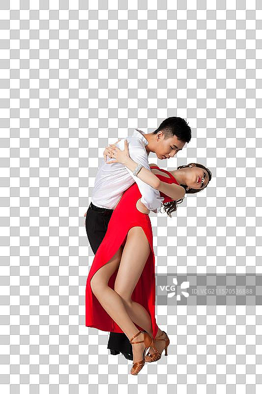 棚拍一对年轻的国标舞演员跳探戈图片素材