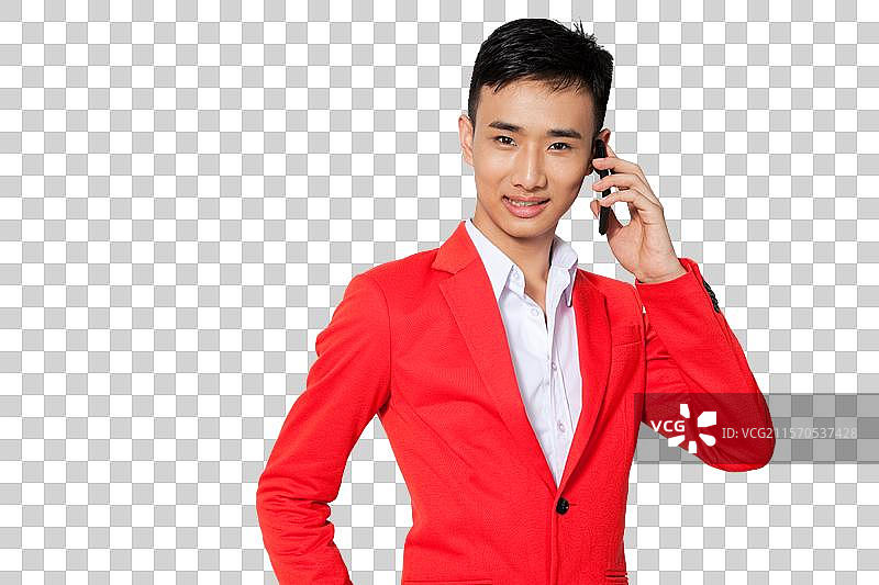 棚拍穿红色西装的年轻男人打手机图片素材