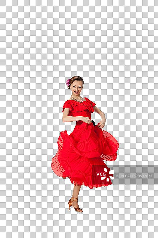 棚拍穿红色连衣裙跳舞的年轻女人图片素材