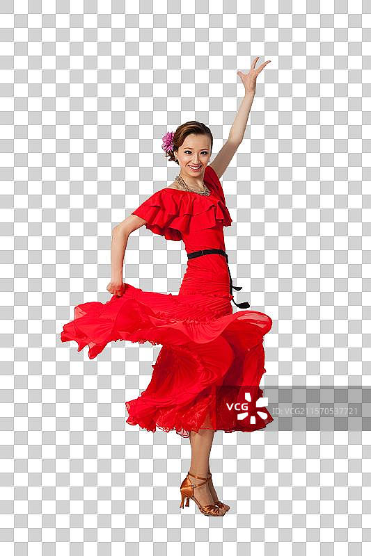棚拍穿红色连衣裙跳舞的年轻女人图片素材