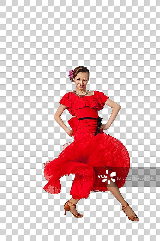 棚拍穿红色连衣裙跳舞的年轻女人图片素材