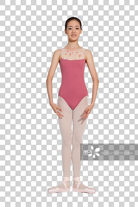 棚拍年轻的芭蕾舞女演员练习基本功图片素材