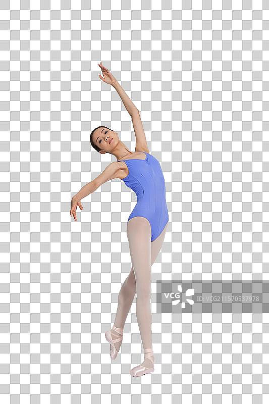 棚拍年轻的芭蕾舞女演员练习基本功图片素材