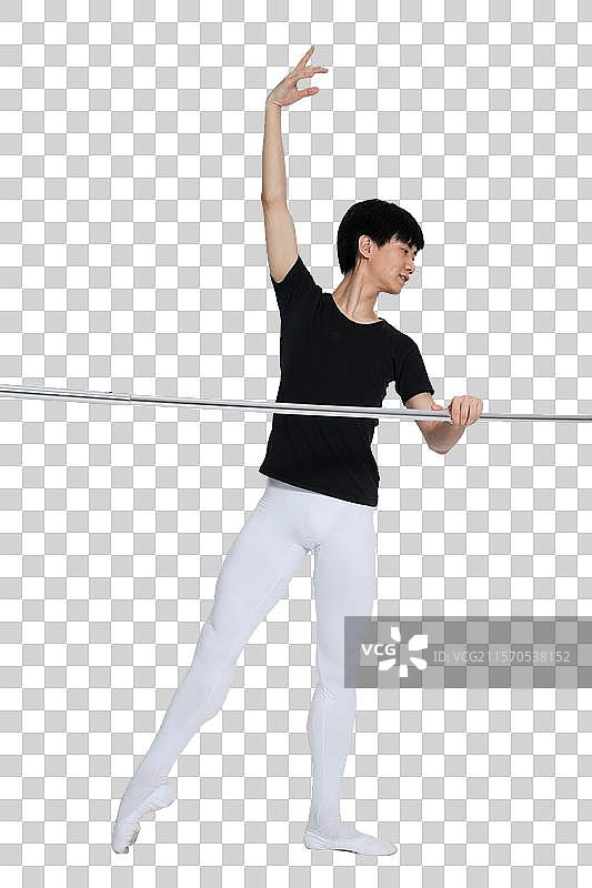 棚拍年轻的芭蕾舞男演员练习基本功图片素材