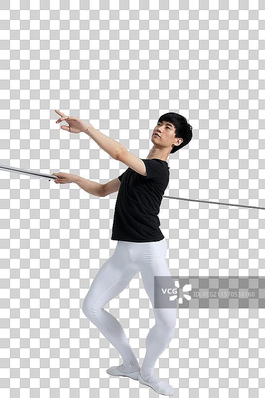 棚拍年轻的芭蕾舞男演员练习基本功图片素材