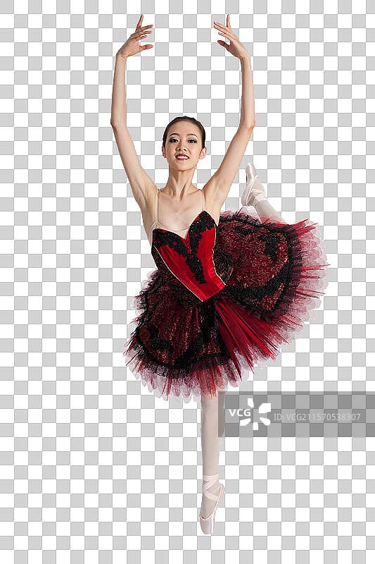 棚拍年轻女演员跳芭蕾舞图片素材