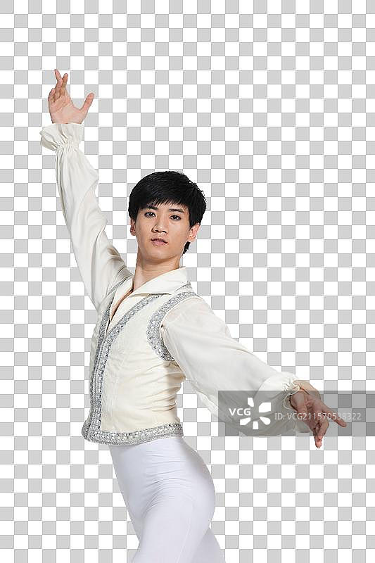棚拍年轻男演员跳芭蕾舞图片素材