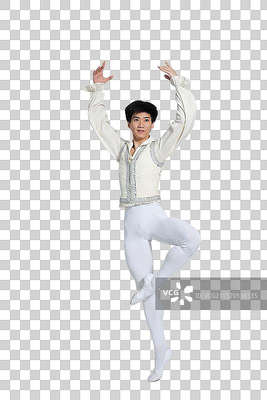 棚拍年轻男演员跳芭蕾舞图片素材