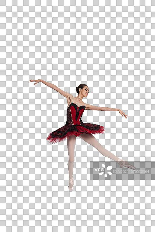 棚拍年轻女演员跳芭蕾舞图片素材