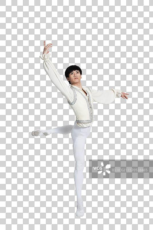 棚拍年轻男演员跳芭蕾舞图片素材