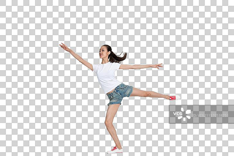 棚拍年轻女人跳舞图片素材