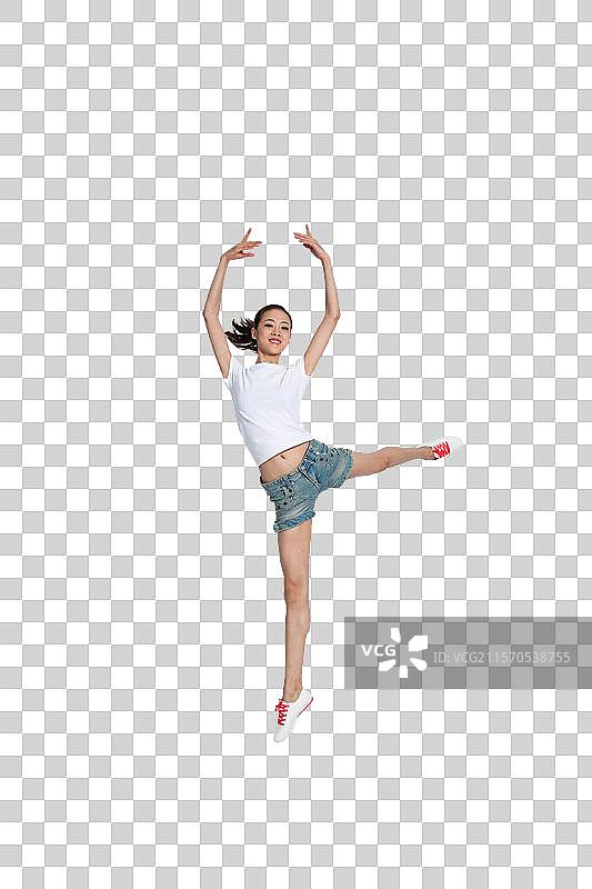 棚拍年轻女人跳舞图片素材