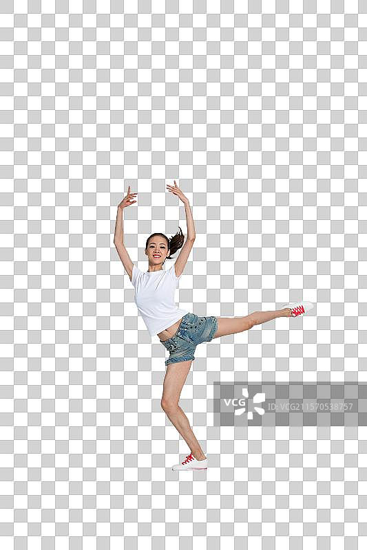 棚拍年轻女人跳舞图片素材