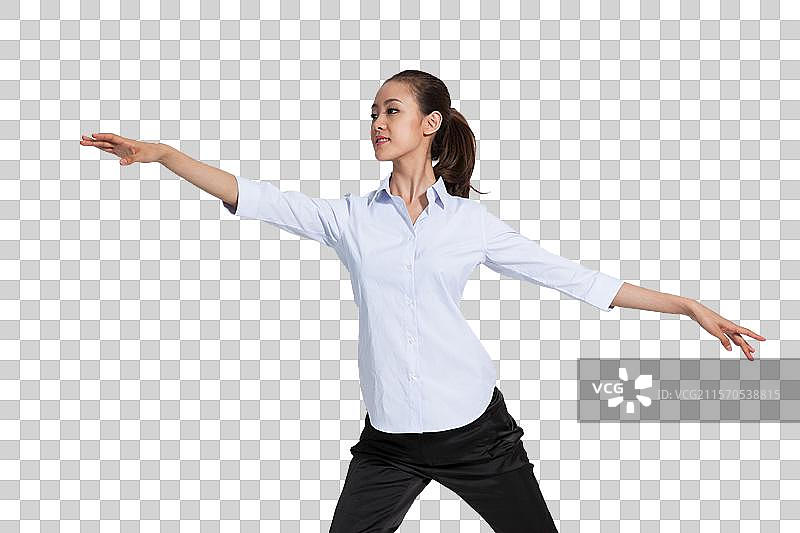 棚拍年轻女人跳舞图片素材