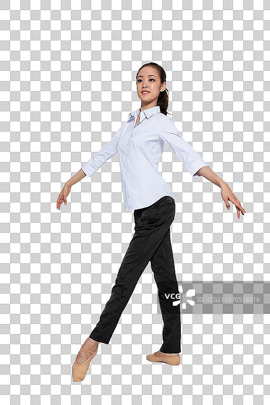 棚拍年轻女人跳舞图片素材