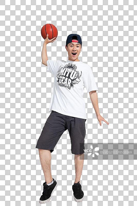 棚拍年轻男人玩篮球图片素材