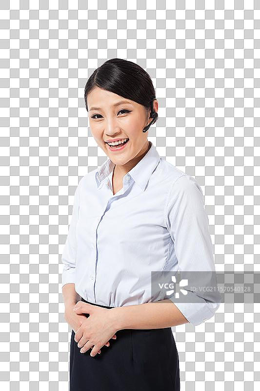 棚拍戴蓝牙耳机的年轻商务女士图片素材