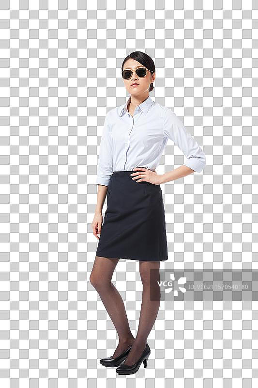 棚拍戴墨镜的年轻商务女士图片素材