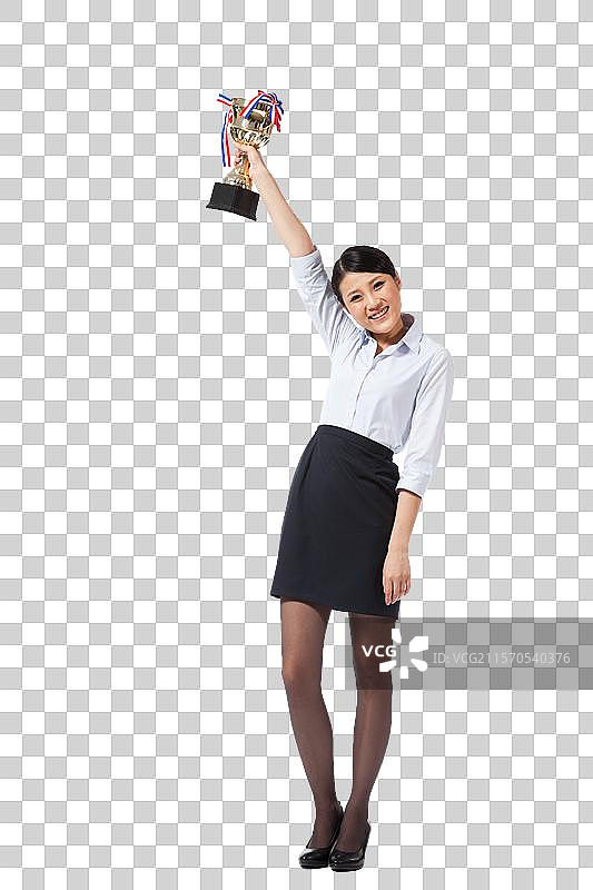 棚拍年轻商务女士拿着奖杯图片素材