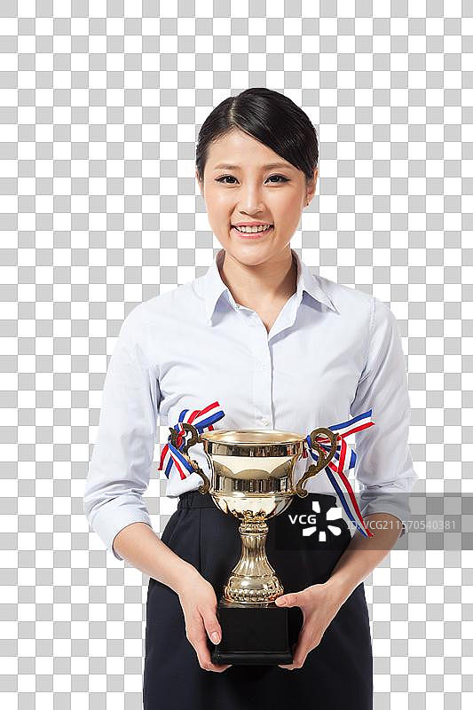 棚拍年轻商务女士拿着奖杯图片素材